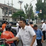 Ajak Masyarakat Jaga Kesehatan, PSI Sumut Bagikan Masker ke Masyarakat