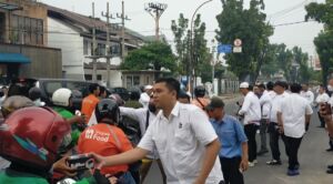 Ajak Masyarakat Jaga Kesehatan, PSI Sumut Bagikan Masker ke Masyarakat